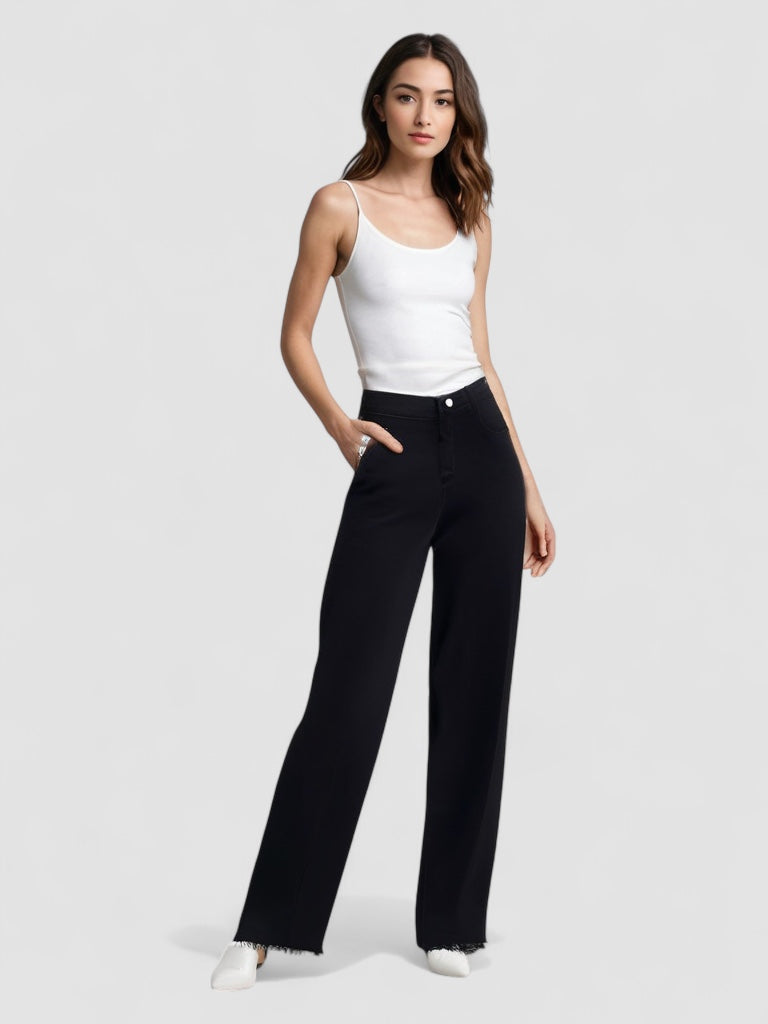 Maya™ | Elegant Black Jeans with Raw Finish